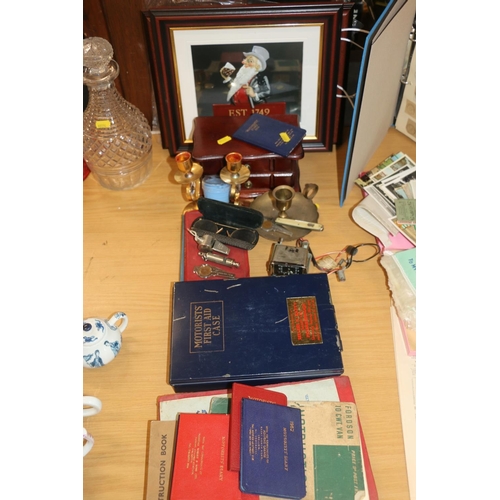 218 - Automobilia to include a Motorist's First Aid case, a Smith's dash clock, motorist's diaries, instru... 