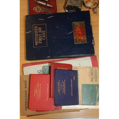 218 - Automobilia to include a Motorist's First Aid case, a Smith's dash clock, motorist's diaries, instru... 