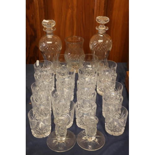 27 - Cut-glass ware to include two decanters, a matching vase, tumblers, and a pair of Edinburgh Crystal ... 