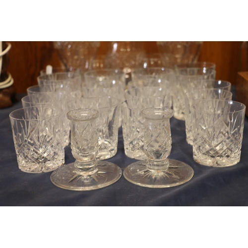 27 - Cut-glass ware to include two decanters, a matching vase, tumblers, and a pair of Edinburgh Crystal ... 