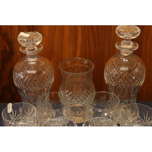 27 - Cut-glass ware to include two decanters, a matching vase, tumblers, and a pair of Edinburgh Crystal ... 