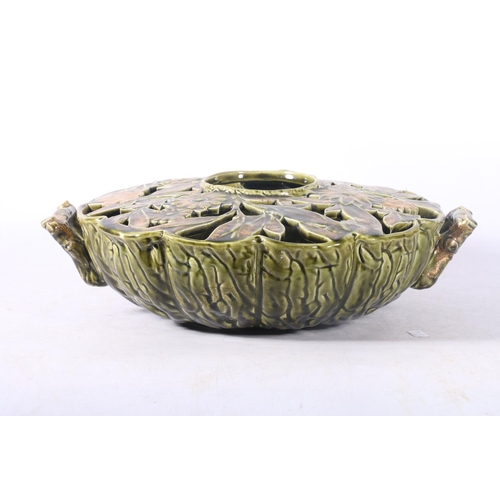 38 - Eastern European reticulated ceramic centrepiece decorated with cabbage leaf bottom and floral top, ... 