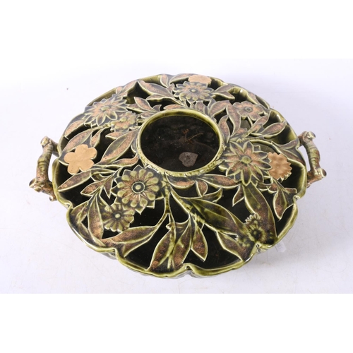 38 - Eastern European reticulated ceramic centrepiece decorated with cabbage leaf bottom and floral top, ... 