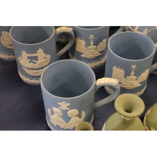 65 - Wedgwood Jasper Ware to include six tankards, two water jugs, and a smaller commemorative cup.