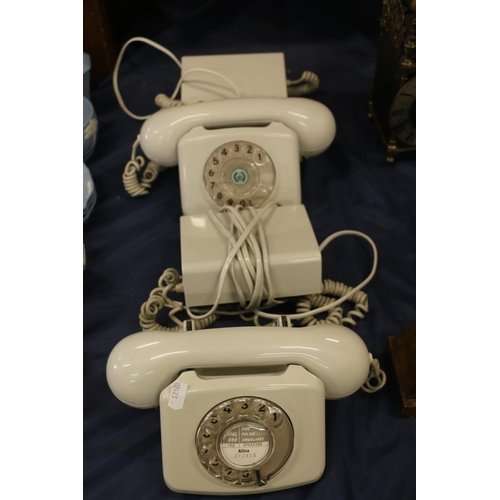 76 - Two vintage telephones.