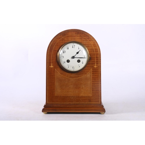 79 - Mahogany and inlaid arch-top mantel clock, movement marked Japy Freres, 31cm high.