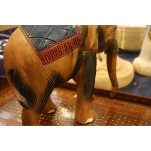 85 - Carved treen model of an elephant, 28cm high.