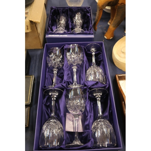 86 - Six Edinburgh Crystal wine glasses, boxed, and two Edinburgh Crystal champagne flutes, also boxed.