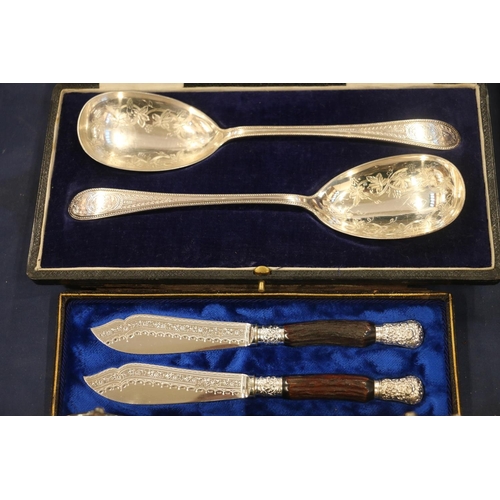 87 - EPNS flatware to include serving spoons, a cruet set and a cream jug and sugar dish.