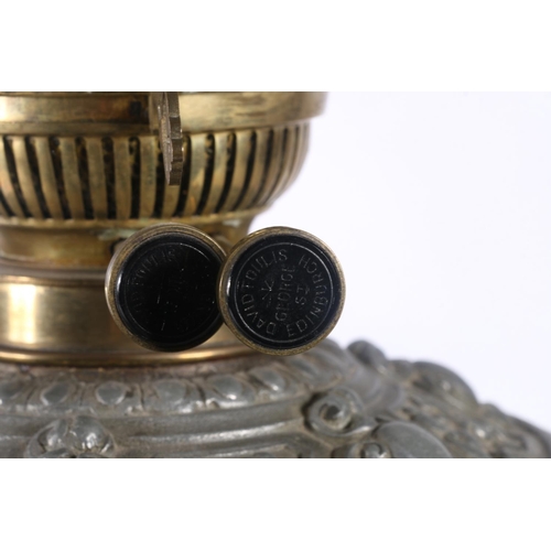 9 - David Foulis of Edinburgh cast metal and glass oil lamp, decorated with repousse masks and scrolls, ... 