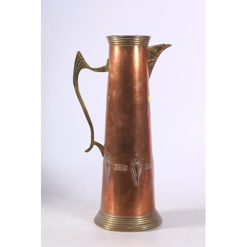 95 - Art Nouveau style copper and brass ewer in the manner of WMF, 32cm.