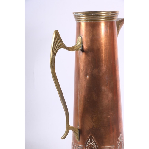 95 - Art Nouveau style copper and brass ewer in the manner of WMF, 32cm.