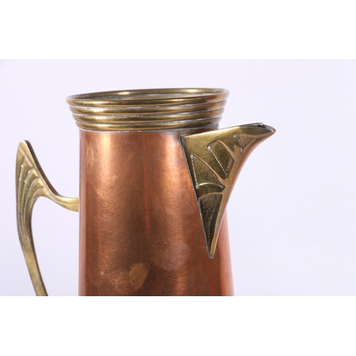 95 - Art Nouveau style copper and brass ewer in the manner of WMF, 32cm.