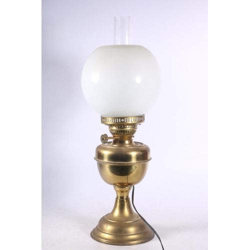 99 - Brass oil lamp converted for electricity, 51cm.