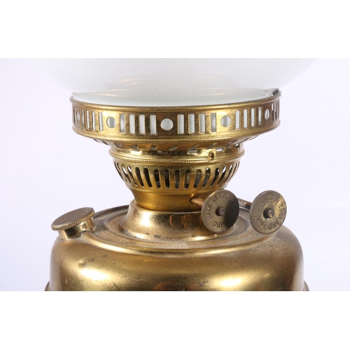 99 - Brass oil lamp converted for electricity, 51cm.