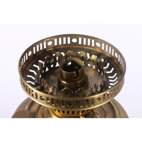 99 - Brass oil lamp converted for electricity, 51cm.