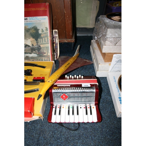 209 - Child's Bontempi battery operated accordion, and a Sanchis of Spain model of Concorde.