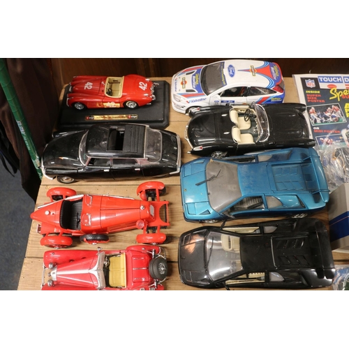 233 - Die-cast model cars, mainly Burago models.