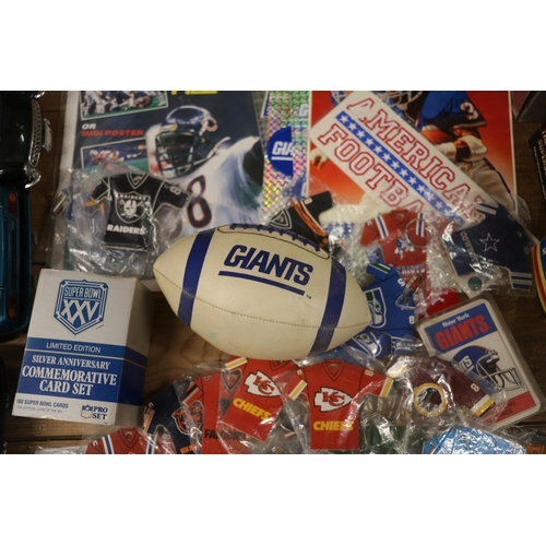 234 - NFL interest, keyrings, Giant's ball, a silver anniversary commemorative card set, and related items... 