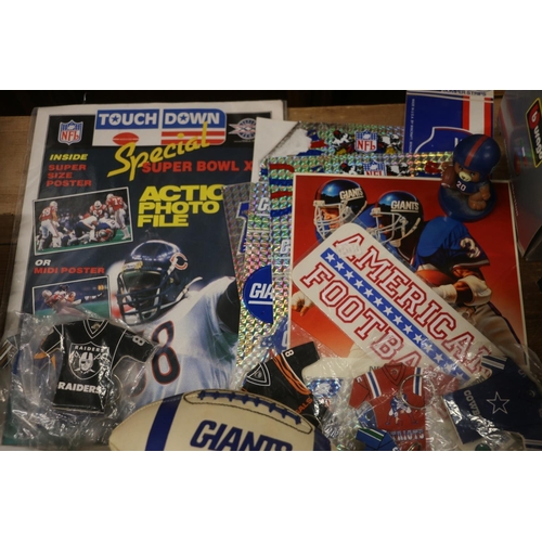 234 - NFL interest, keyrings, Giant's ball, a silver anniversary commemorative card set, and related items... 