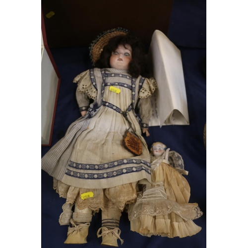 104 - German bisque headed doll by Armand Marseille, and another smaller, largest 46cm.