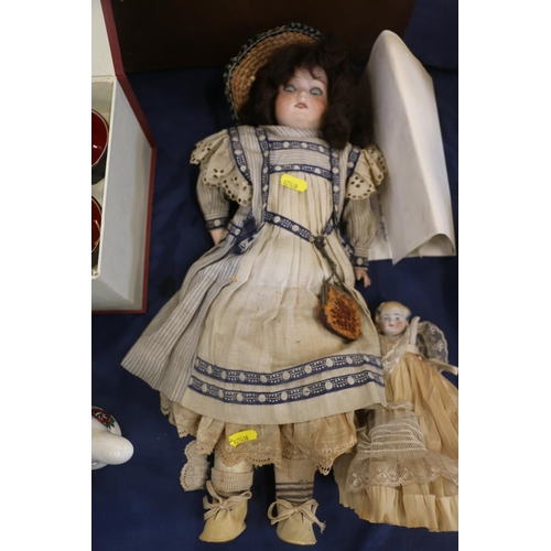 104 - German bisque headed doll by Armand Marseille, and another smaller, largest 46cm.