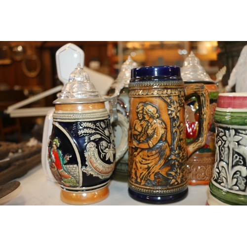 123 - German style steins.  (7)