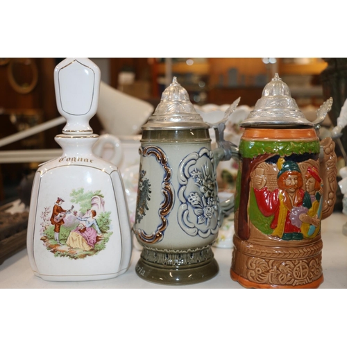 123 - German style steins.  (7)