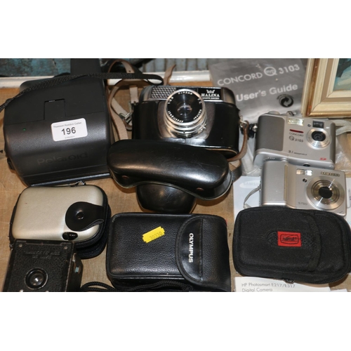 196 - Vintage cameras to include Polaroid, Halina, Samsung, Concord, Olympus in fitted case. 