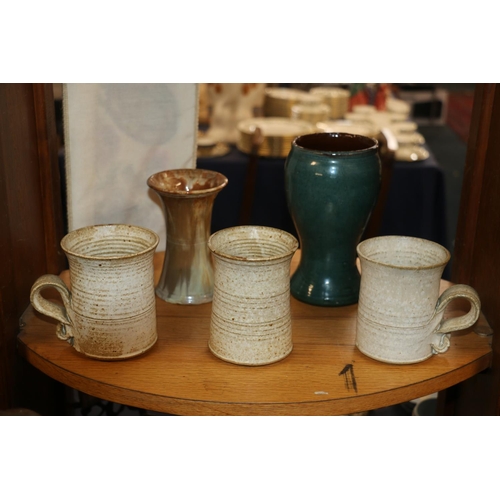 61 - Studio Pottery to include a Schofield Penrith green glazed baluster vase, a Pembury ware vase, and t... 