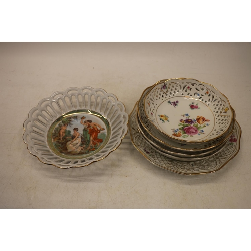 57C - Schumann Dresden reticulated porcelain to include three bowls, another smaller, and a plate, along w... 