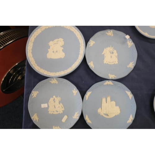 64 - Wedgwood Jasperware commemorative plates to include Christmas, Man on the Moon, etc.