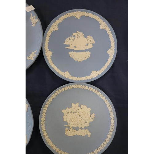 64 - Wedgwood Jasperware commemorative plates to include Christmas, Man on the Moon, etc.