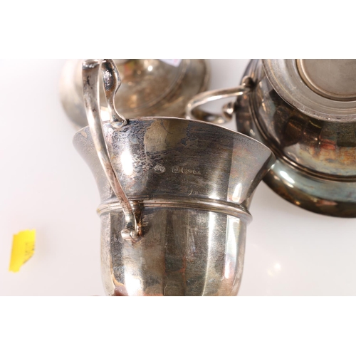 12 - Hallmarked silver cream jug and matching sugar bowl, Adie Brothers, Birmingham 1930, together with a... 