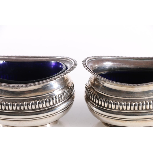 13 - Pair of Edward VII silver salts with gadroon borders, Chester 1903, together with a hallmarked silve... 