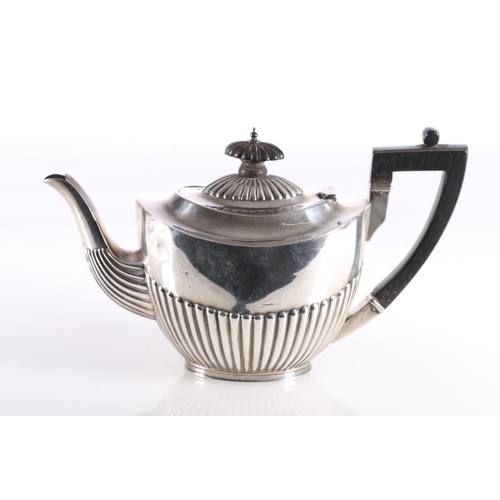 19 - Victorian silver teapot and matching sugar bowl, the teapot with half lobed body with ebony finial a... 