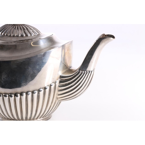 19 - Victorian silver teapot and matching sugar bowl, the teapot with half lobed body with ebony finial a... 