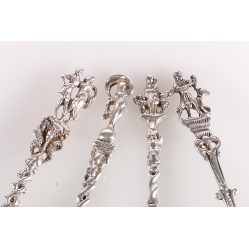 22 - Four silver presentation rat tailed spoons with shaped handles and figural terminals, Marshall and S... 