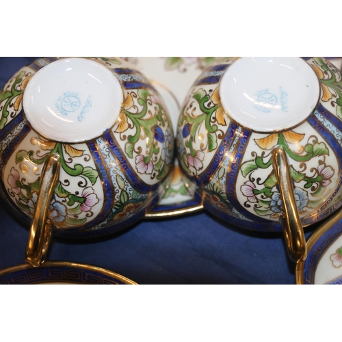 81 - Six Noritake floral decorated tennis sets, and a Paragon blue and gilt decorated coffee pot.