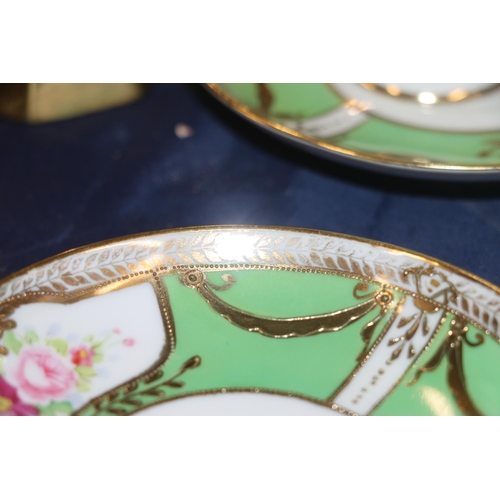 91 - Six Noritake floral and gilt decorated cups and saucers, etc.