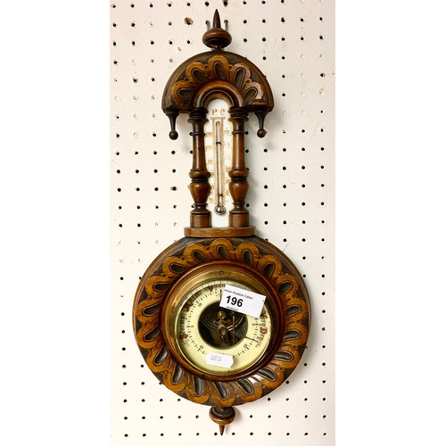 196 - Carved oak barometer.