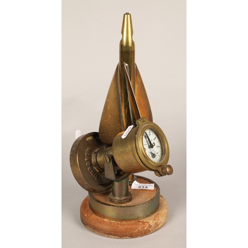 214 - Brass maritime knot measure and gauge mounted on a circular base.