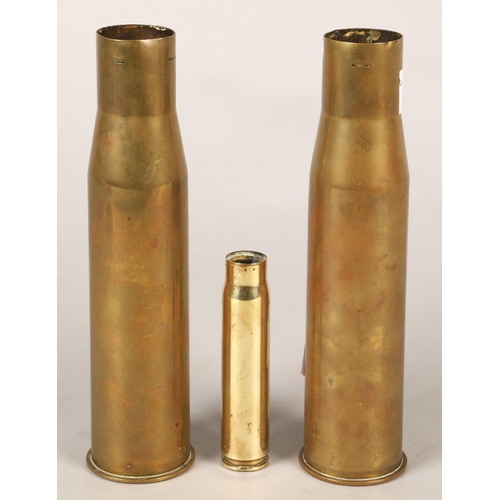 222 - Pair of brass shell cases 22cm and another smaller (3)