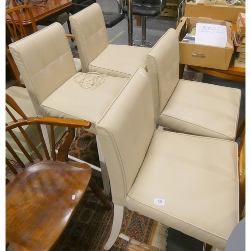 359 - Set of four cream leather modern stools.