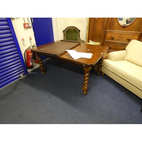 449 - Oak telescopic dining table, c. early 20th century, with one additional leaf, on barley column suppo... 