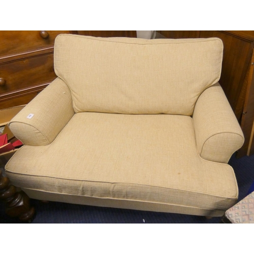 450 - Modern cream sofa chair.