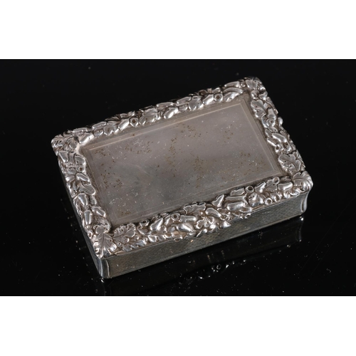 103 - Victorian antique parcel gilt silver table snuff box of rectangular form with relief floral border a... 