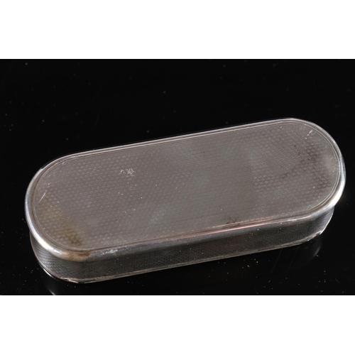 106 - Victorian antique silver snuff box of stadium shape with all over engine turned decoration, the inte... 