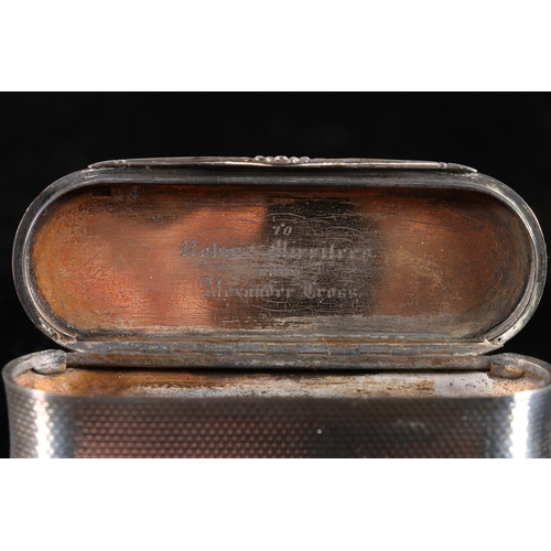 106 - Victorian antique silver snuff box of stadium shape with all over engine turned decoration, the inte... 