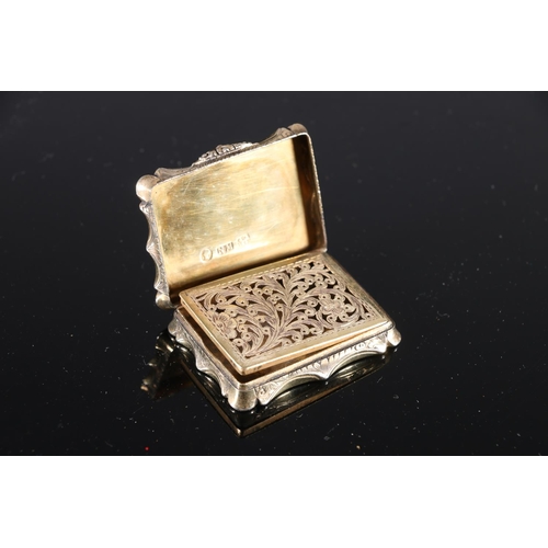 108 - Victorian antique parcel gilt silver vinaigrette of rectangular form with serpentine edge having all... 